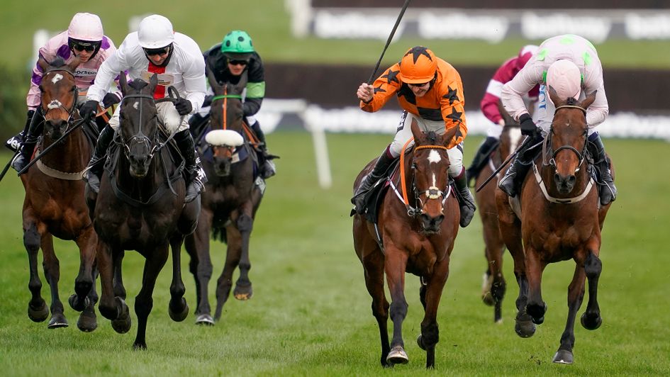 Put The Kettle On (orange silks) wins the Betway Queen Mother Champion Chase