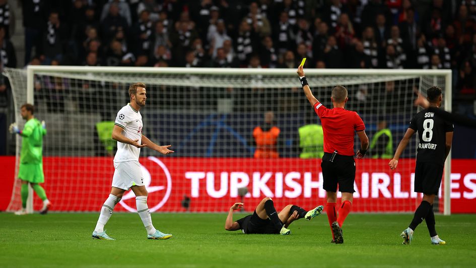 Harry Kane is booked in Tottenham's clash with Eintracht Frankfurt