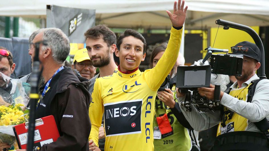 Colombian cyclist Egan Bernal celebrates with the yellow jersey at the Tour de France