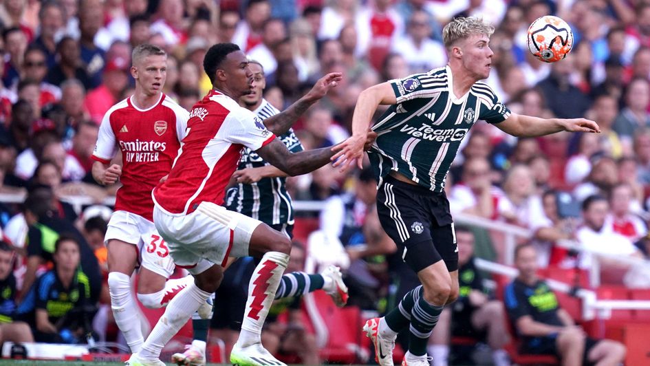 Manchester United's Rasmus Hojlund and Arsenal's Gabriel battle for the ball