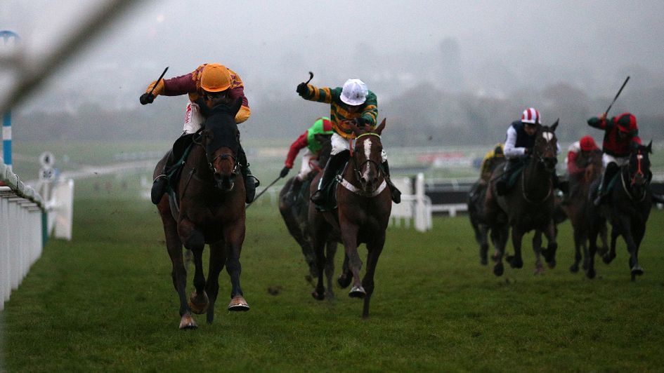 Israel Champ in winning action at Cheltenham