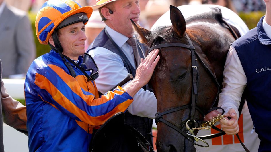 Ryan Moore has a pat for Man's Best Friend