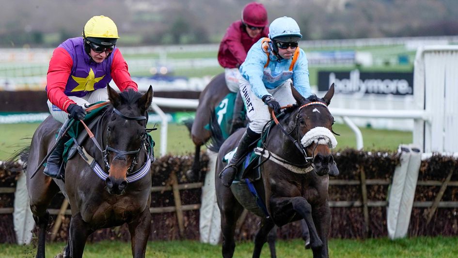 Marie's Rock (right) gets the better of Dashel Drasher at Cheltenham