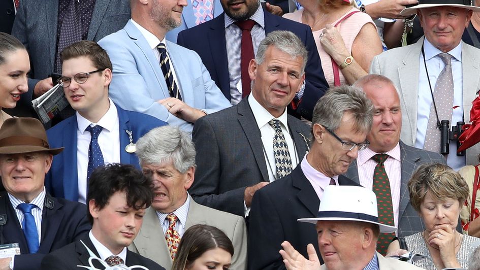 Race goers enjoying the good atmosphere and good weather