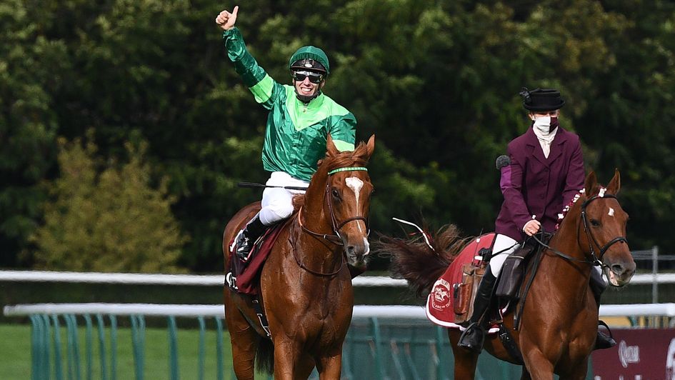 Cristian Demuro celebrates on Sottsass after winning the Arc