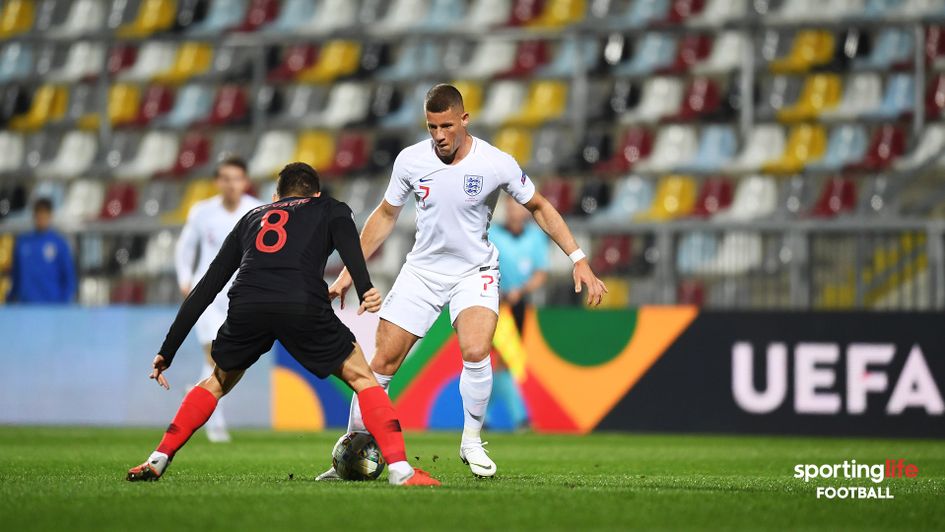 England's Ross Barkley (right) looks to beat Croatia's Mateo Kovacic