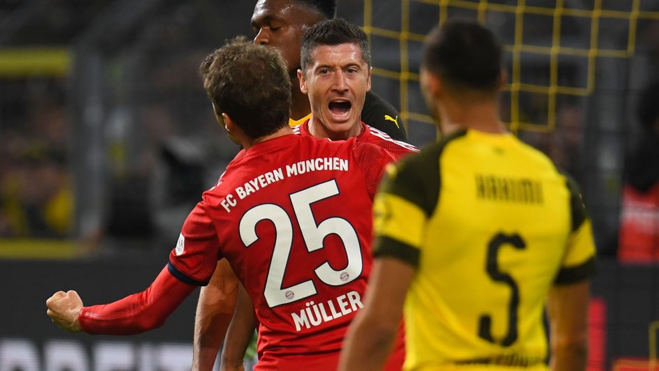 Robert Lewandowski of Bayern Munich celebrates after scoring against old club Borussia Dortmund