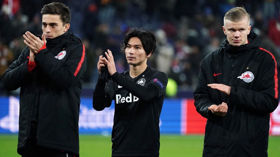 Takumi Minamino (centre): Pictured after RB Salzburg's defeat to Liverpool in the Champions League
