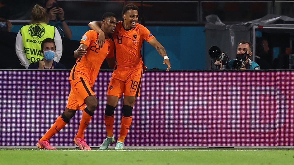 Netherlands' defender Denzel Dumfries celebrates