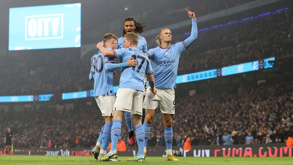 Manchester City celebrate a goal against Liverpool