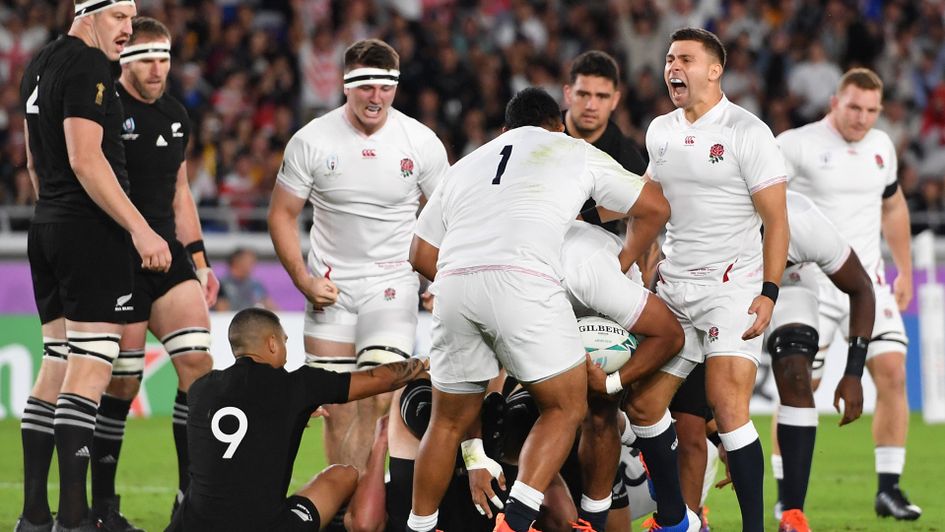 England celebrate their famous semi-final victory over New Zealand