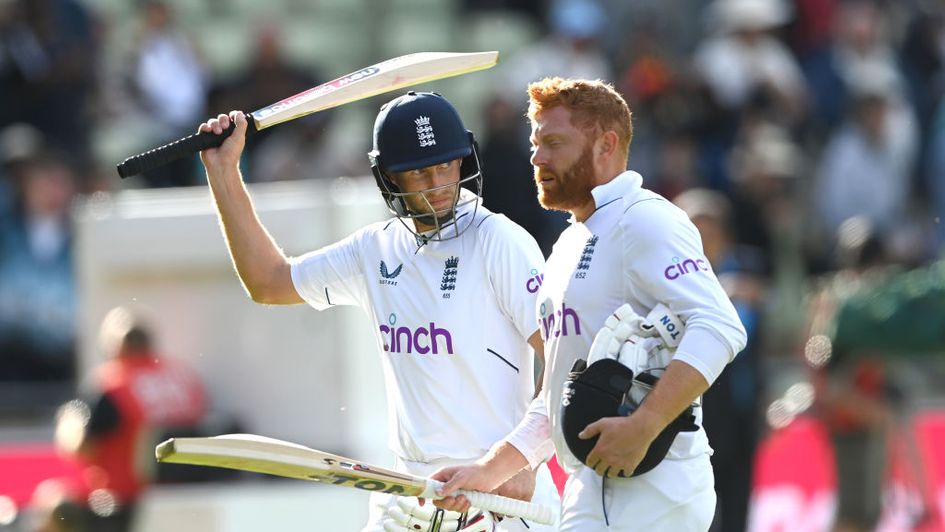 Joe Root and Jonny Bairstow leave the field