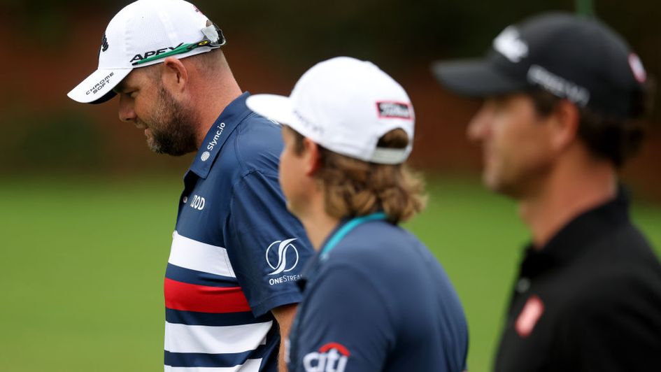 Cameron Smith (centre) might be a vulnerable favourite in the top Australian market