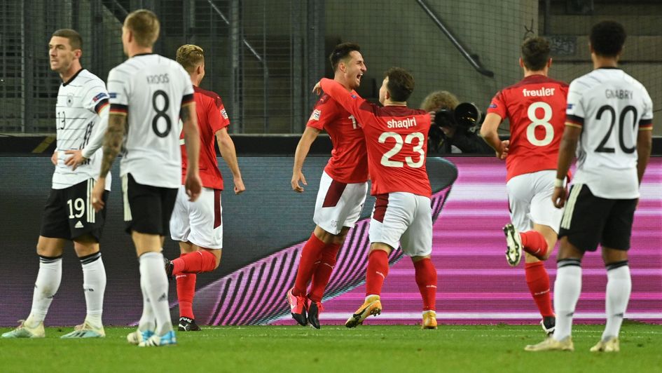 Switzerland's forward Josip Drmic celebrates scoring against Germany