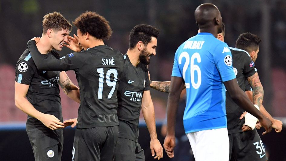 John Stones and Manchester City celebrate