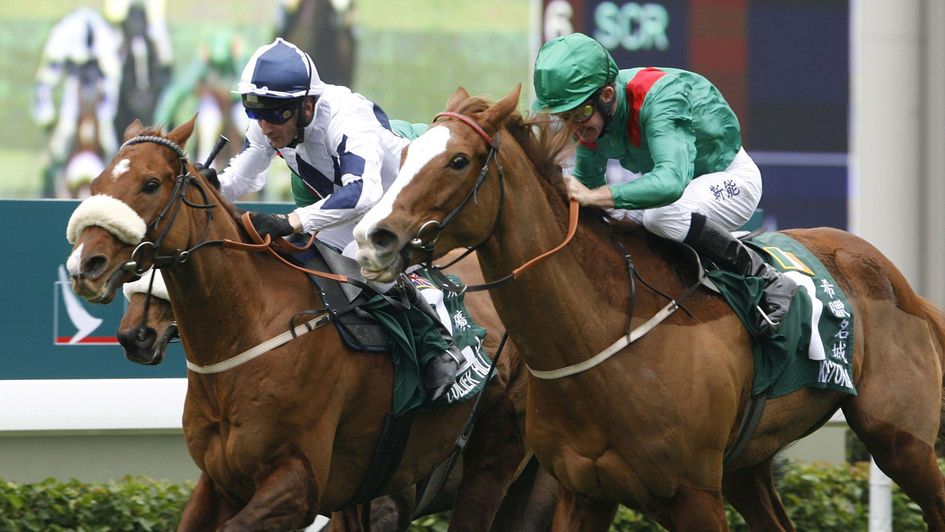 Collier Hill (left) wins in Hong Kong