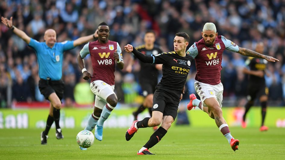 Phil Foden gets the better of Douglas Luiz
