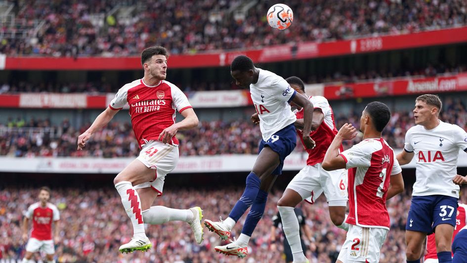 Declan Rice and Pape Matar Sarr compete for the ball