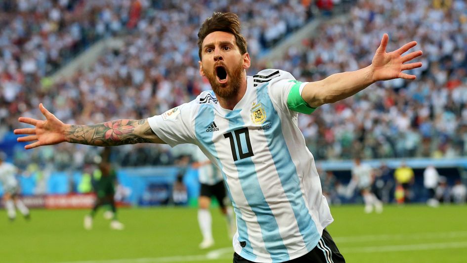 Lionel Messi celebrates his goal against Nigeria