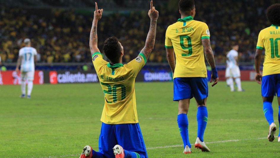 Roberto Firmino celebrates after scoring Brazil's second goal
