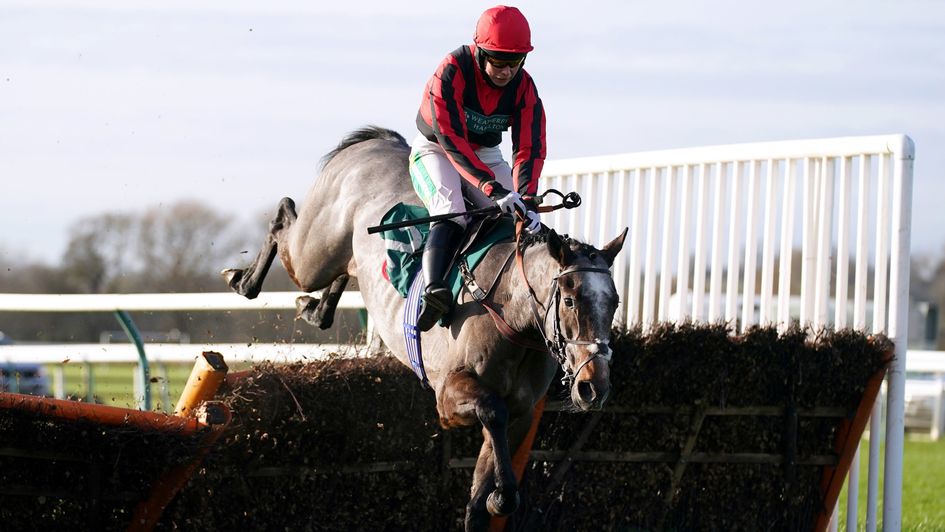 Graystone ridden by jockey Bryony Frost clears a hurdle on their way to winning at Warwick