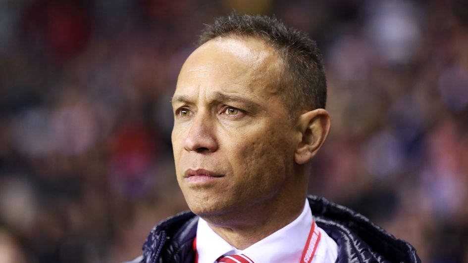 Adrian Lam watches Wigan in action in the World Club Challenge