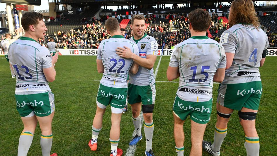 Northampton Saints celebrate their victory at Lyon