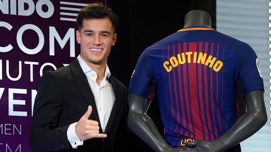 Philippe Coutinho with his new shirt