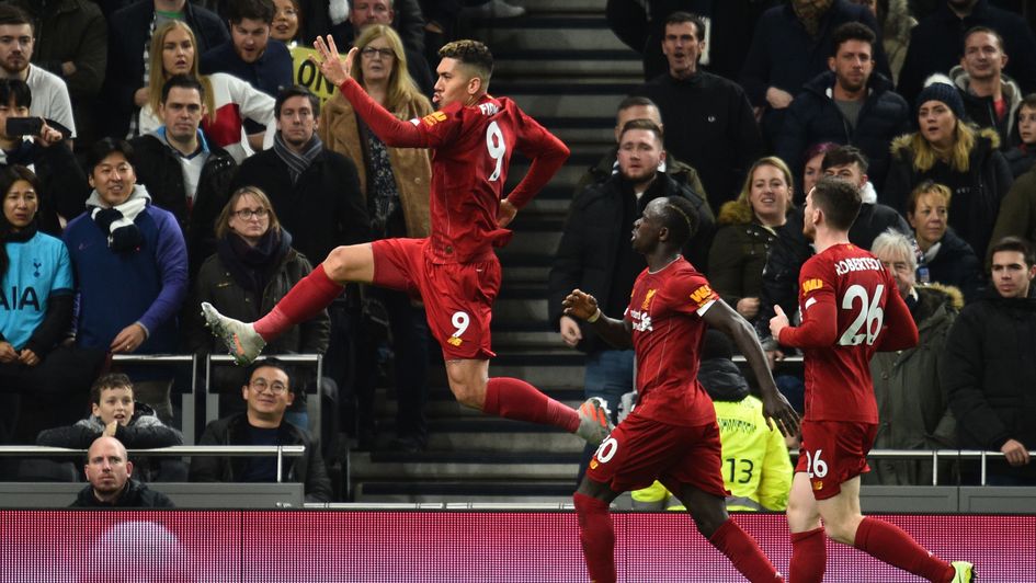 Roberto Firmino: Liverpool forward celebrates his strike at Tottenham