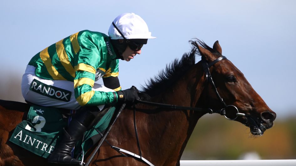 Mark Walsh riding Fakir D'oudairies to victory at Aintree