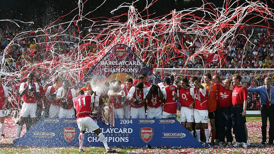 Arsenal celebrate Premier League success after an unbeaten season in 2004
