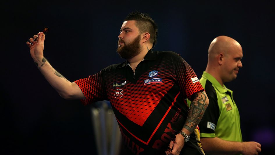 Michael Smith in action against Michael van Gerwen