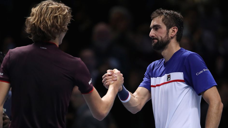 Marin Cilic (l) congratulates Alex Zverev