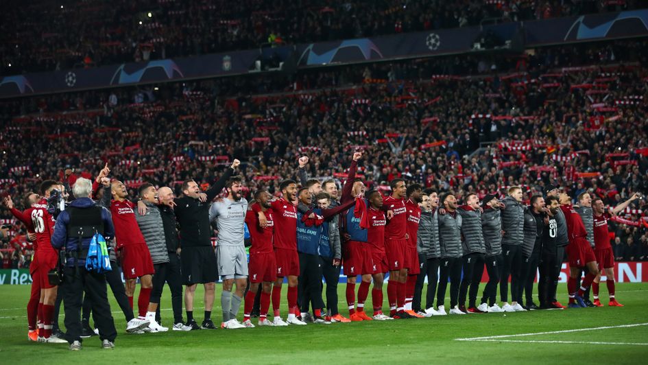 Liverpool players celebrate with fans after reaching the Champions League final