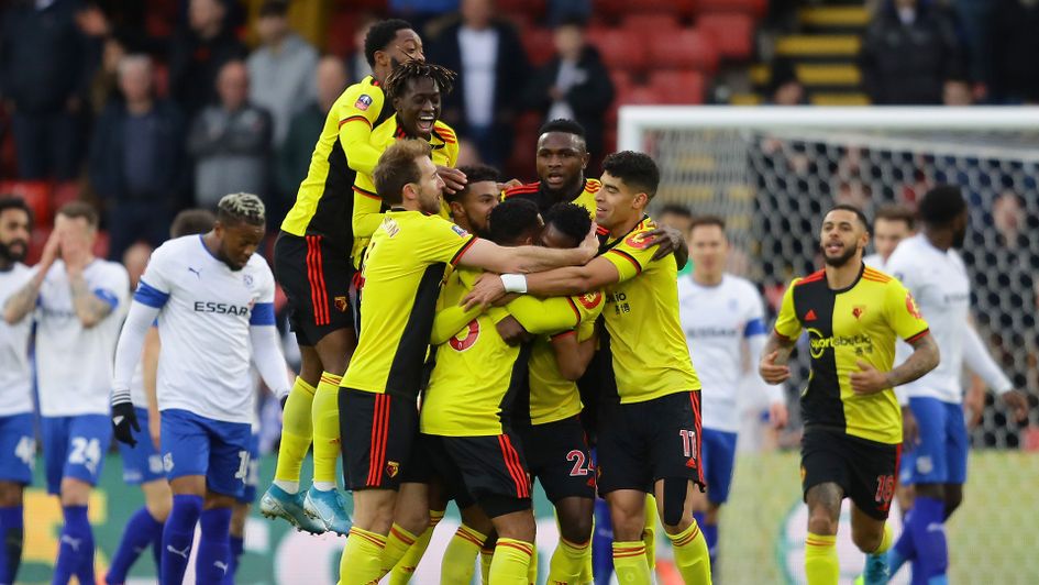 Watford celebrate Tom Dele-Bashiru's goal at Tranmere