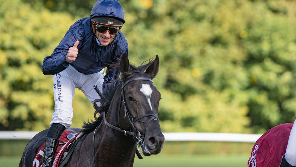 Thumbs up from Christophe Soumillon after Puerto Rico wins the Lagardere at Longchamp