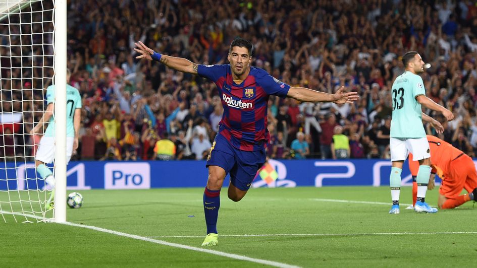 Luiz Suarez: Barcelona forward celebrates his goal against Inter Milan in the Champions League