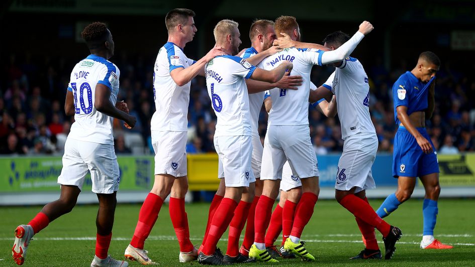 Portsmouth celebrate after scoring against AFC Wimbledon