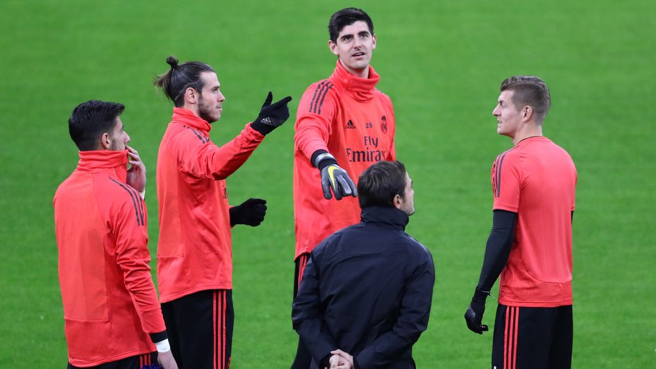 Gareth Bale: Welshman in discussion with Real Madrid team-mates Toni Kroos (right) and Thibaut Courtois (centre)