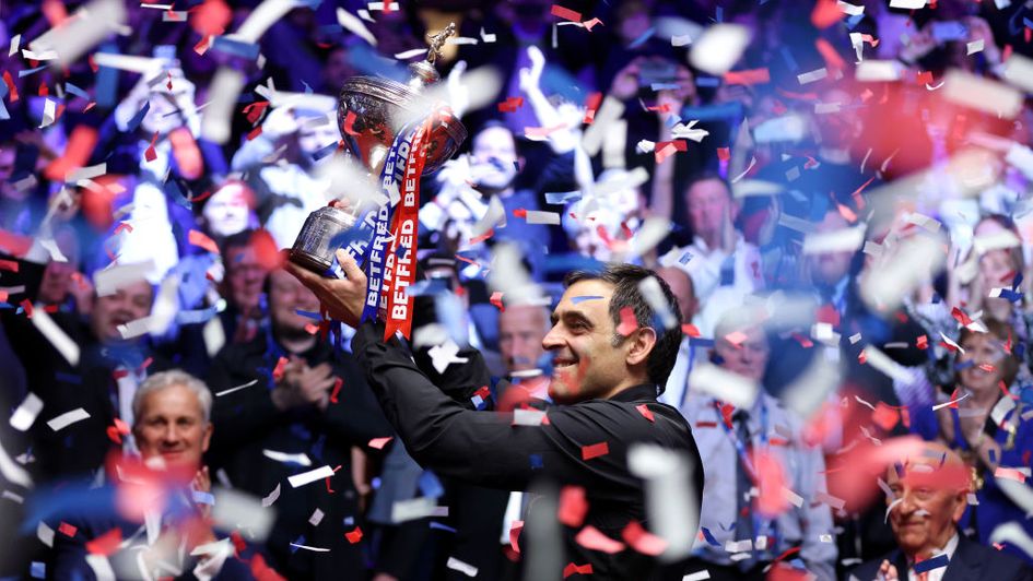 Ronnie O'Sullivan with the World Championship trophy