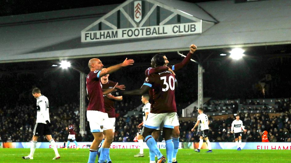 Michail Antonio of West Ham United celebrates with teammates at Fulham
