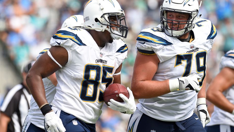 Antonio Gates and Kenny Wiggins of the Chargers celebrate a touchdown 