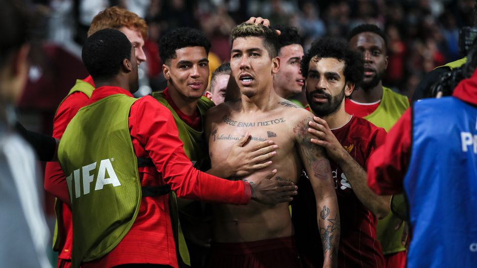 Liverpool celebrate Roberto Firmino's goal in extra-time during their Club World Cup win over Flamengo