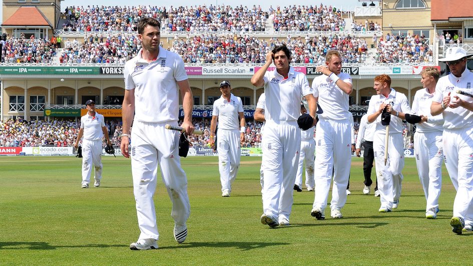 James Anderson leads England from the field
