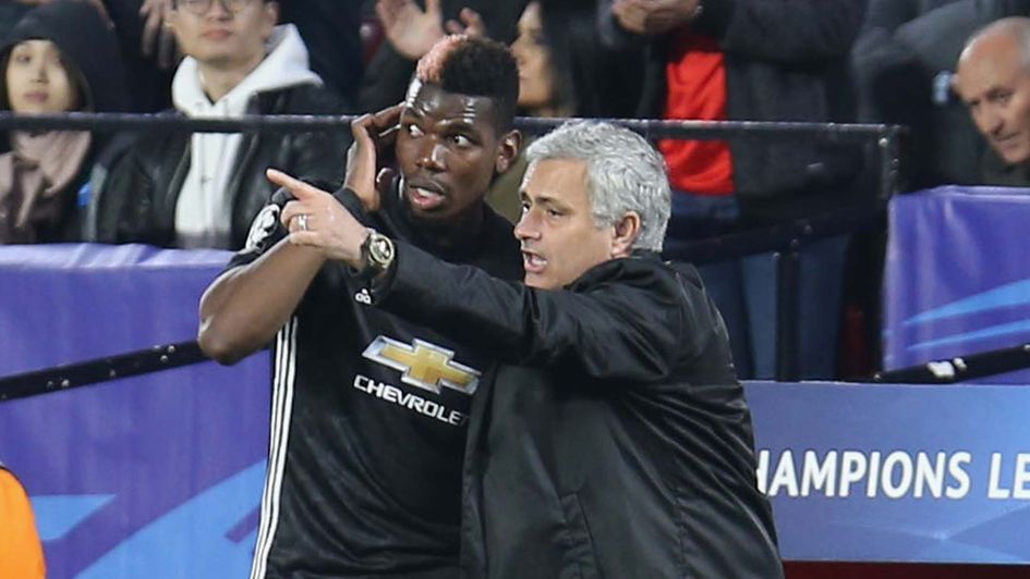 Manchester United manager Jose Mourinho with Paul Pogba