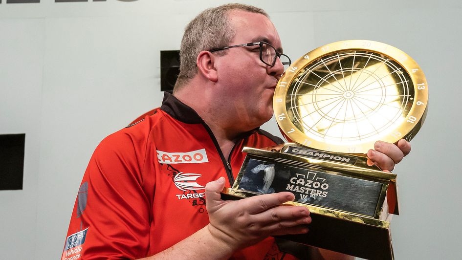 Stephen Bunting celebrates with his son (Picture: Taylor Lanning/PDC)