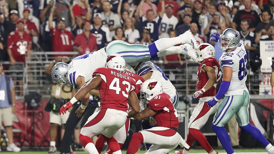 Dak Prescott of Dallas dives in for a touchdown