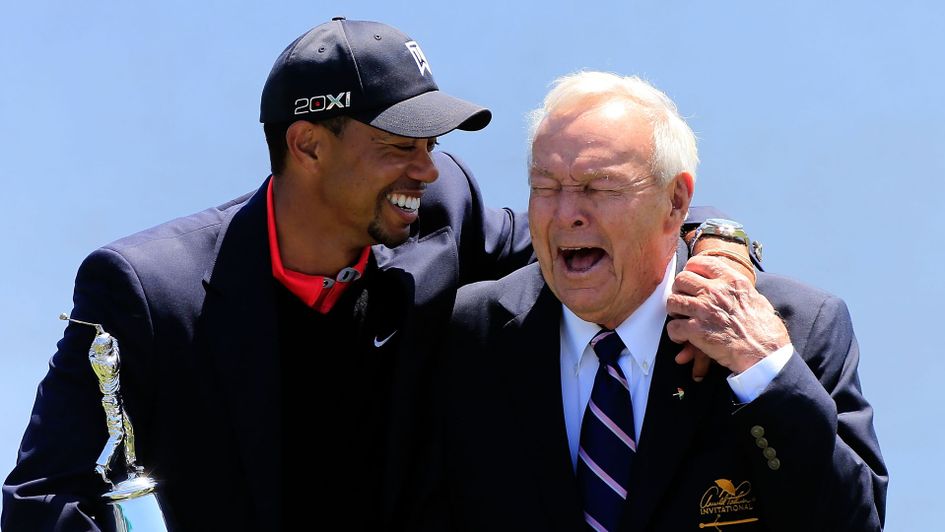 Tiger Woods and Arnold Palmer