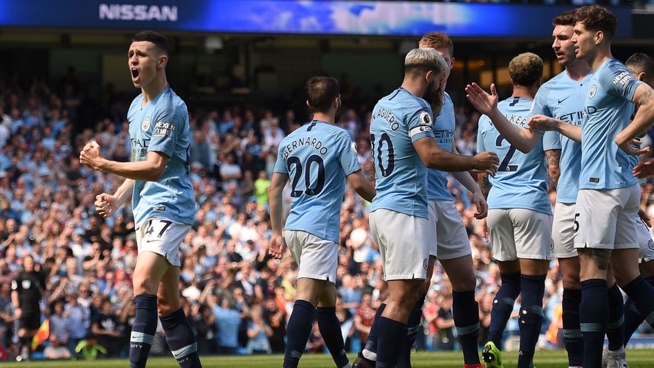 Phil Foden celebrates scoring the opening goal for Manchester City against Tottenham in the Premier League