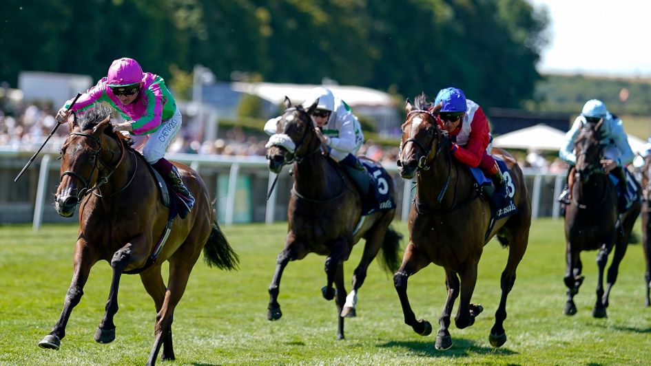 Prosperous Voyage (left) wins the Falmouth Stakes